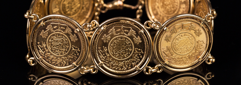 Seven Saudi Arabia gold guineas mounted as a bracelet Hammer price: £1,500