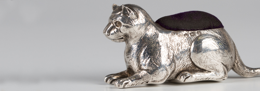 Edwardian silver novelty pin cushion in the form of a recumbent cat, Birmingham 1908 by Adie & Lovekin Ltd