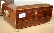 A Regency burr yew work box of sarcophagus form, together with a Victorian walnut box and a rosewood box.