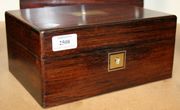 A Victorian rosewood work box with brass plaque and escutcheon, another Victorian rosewood work box and a Victorian mahogany work box (restoration).