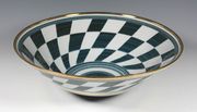 Estimate: £150-200
Ben Barker - 'Decorative Bowl', hand-thrown porcelain with sgraffito geometric design and 23 carat gold gilding, signed with initials, diameter approx 35cm.