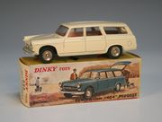 A French Dinky Toys No. 525 commerciale |404| Peugeot, finished in cream with jewelled headlights, boxed.