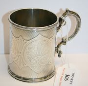 A Victorian silver christening tankard, the cylindrical body engraved with anthemion band, reserved against an engine turned ground, within beaded borders, flanked by a reeded scroll handle, London 1867, height approx 9.2cm.