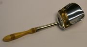 A George III silver caddy shovel with turned ivory handle, Birmingham 1801 by Joseph Taylor.