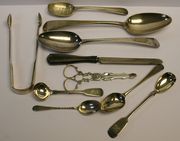 A pair of George III silver sugar nips, Chester 1911, two George III silver tablespoons, London 1790 and 1785 by William Sumner, a pair of George III silver Fiddle pattern sugar tongs with shell bowls, Newcastle 1808 by Thomas Watson, a Victorian silver Fiddle pattern mustard spoon, Exeter 1854 by James and Josiah Williams, four other silver spoons and a knife.