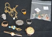 A 9ct gold and shell cameo bar brooch, designed as the portrait of a lady, another brooch, a silver and enamelled nurse's badge, detailed 'Royal Victoria Hospital Folkestone', a 9ct gold ring mount, three further rings, a 9ct gold pendant cross on a gilt metal chain, another pendant with a chain, a 9ct gold circular cased lady's wristwatch, Birmingham 1918, four pairs of earrings and two odd earstuds.