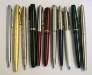 A Sheaffer sterling silver ballpoint pen with scrolling decoration, a Sheaffer gilt metal fountain pen and a Sheaffer steel ballpoint pen, together with eight Parker writing implements.