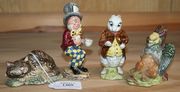 A Beswick Alice Series 'Cheshire Cat', model No. 2480, together with three other Alice figures, comprising 'Gryphon', model No. 2485, White Rabbit and Mad Hatter (last two unmarked and with faults).
