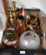 A copper oil lamp, a pair of brass ejector candlesticks, a copper frying pan and other metalware.