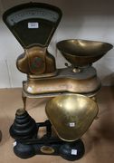 A set of Avery shop scales, raised on cabriole legs, and a set of Salters weighing scales.