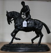 After Pierre Jules Mene - a spelter model of a racehorse with jockey-up, on an integral oval base with cast signature, height approx 41cm.