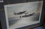 After Robert Taylor - 'Memorial Flight' (Spitfire, Hurricane and Lancaster flying in Formation), late 20th Century colour print, signed in pencil by thirty-one Second World War pilots, including Douglas Bader, Johnnie Johnson, Geoffrey Page, Ivor Broom, James Tait, H. Bird-Wilson and Peter Townsend, approx 44cm x 61cm, within a wood frame. 