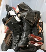 A quantity of Victorian shoes, boots, shoe trees and boot pulls.