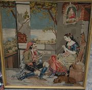 A 19th Century Berlin woolwork panel of a couple seated within a mountainous landscape, worked in coloured wools, approx 69cm x 60cm, within a gilt frame, together with another similar panel of a couple.