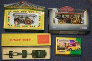 A Dinky Toys No. 697 25-Pounder Field Gun Set, boxed (box creased and torn), a Corgi Vintage Glory Fowler Showman's Engine, a Fairground Attractions Garrett Showman's Tractor and a Showman's Range Morris 1000, all boxed.