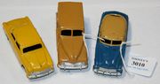 Three Dinky Toys American cars, comprising a No. 27F estate car, a No. 139a Ford Sedan and a No. 139b Hudson Sedan (some paint chips).