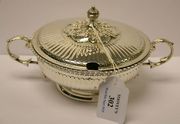 An Edwardian silver two handled bowl and cover with fluted decoration and knop finial, Chester 1907 by Nathan & Hayes, width approx 18.5cm.
