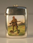 A late Victorian silver and enamel vesta case of rectangular form with hinge lid, the front enamelled with a panel depicting a soldier and inscribed ' A Gentleman in Khaki', Birmingham 1899 by Cornelius Desormeaux Saunders & James Shepherd, length approx 5cm.