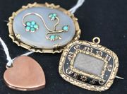 An Edwardian 9ct gold heart shaped pendant locket, Birmingham 1904, a Victorian black enamelled mourning brooch, glazed with a hair locket compartment at the centre, detailed 'In Memory Of', and a Victorian turquoise set and oval agate brooch, with an applied forget-me-not spray motif at the centre.