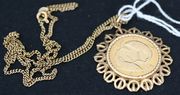 A 9ct gold mounted Pisces pendant, on a 9ct gold faceted curblink neckchain with a boltring clasp.