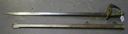 A Victorian Army Pay Corps sword by Wilkinson, with plain straight single edged blade, dated '4 '92', length approx 82.5cm, brass triple bar hilt incorporating VR cypher, marked '11.95 A.P.C. 282', wire bound fishskin covered grip, in its matching steel scabbard, struck 'A.P.C. 11.95'.