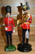 A Michael Sutty limited edition military figure '16th (Queen's) Lancers', No. 71 from an edition of 250, together with a Sitzendorf figure 'Grenadier Guards Captain' (fine hairline to base).