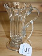 A single handled jelly glass, mid-18th Century, the vertically moulded funnel bowl on a knopped domed foot, height approx 11cm.