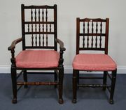 A harlequin set of ten early 19th Century ash bar and spindle back dining chairs with rush seats, comprising two carvers and eight standard chairs, on turned legs and pad feet.