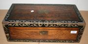 A 19th Century walnut writing slope with brass and ebony inlaid decoration (faults).