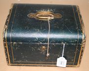 A Victorian leather bound jewellery box of rounded rectangular shape, the hinged lid wand drop-front opening to reveal a compartmentalized tray above two drawers.