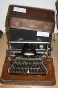 A Blickensderfer No. 7 typewriter within an oak case, together with a Hammond Multiplex typewriter, cased.