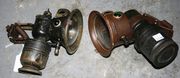 A Panther bicycle lamp and a Miller lamp.