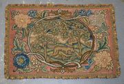 A late 19th Century petit and gros point panel with a design of a dog within an oval landscape, after the needlework panel executed by Mary Queen of Scots, within a stylized flower border, worked in coloured and gilt threads and coloured wools, approx 45cm x 32cm.