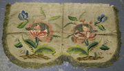 An 18th Century ivory-toned damask panel with two embroidered floral sprays, worked in polychrome silk threads with gilt metal thread highlights and with cellular gilt thread border, approx 61cm x 35cm.