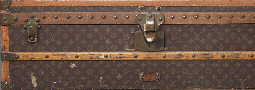 Louis Vuitton travelling trunk with overall monogram and quatrefoil decorated canvas covering