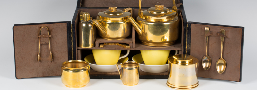 An early 20th century gold plated travelling tea set by Maquet