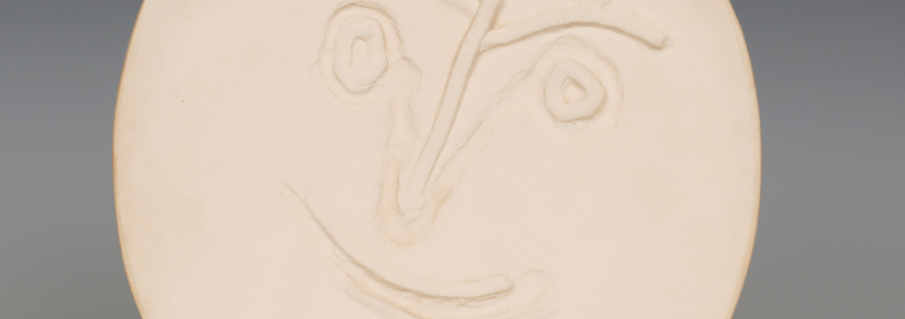 A Pablo Picasso white earthenware 'Face' plate, circa 1960