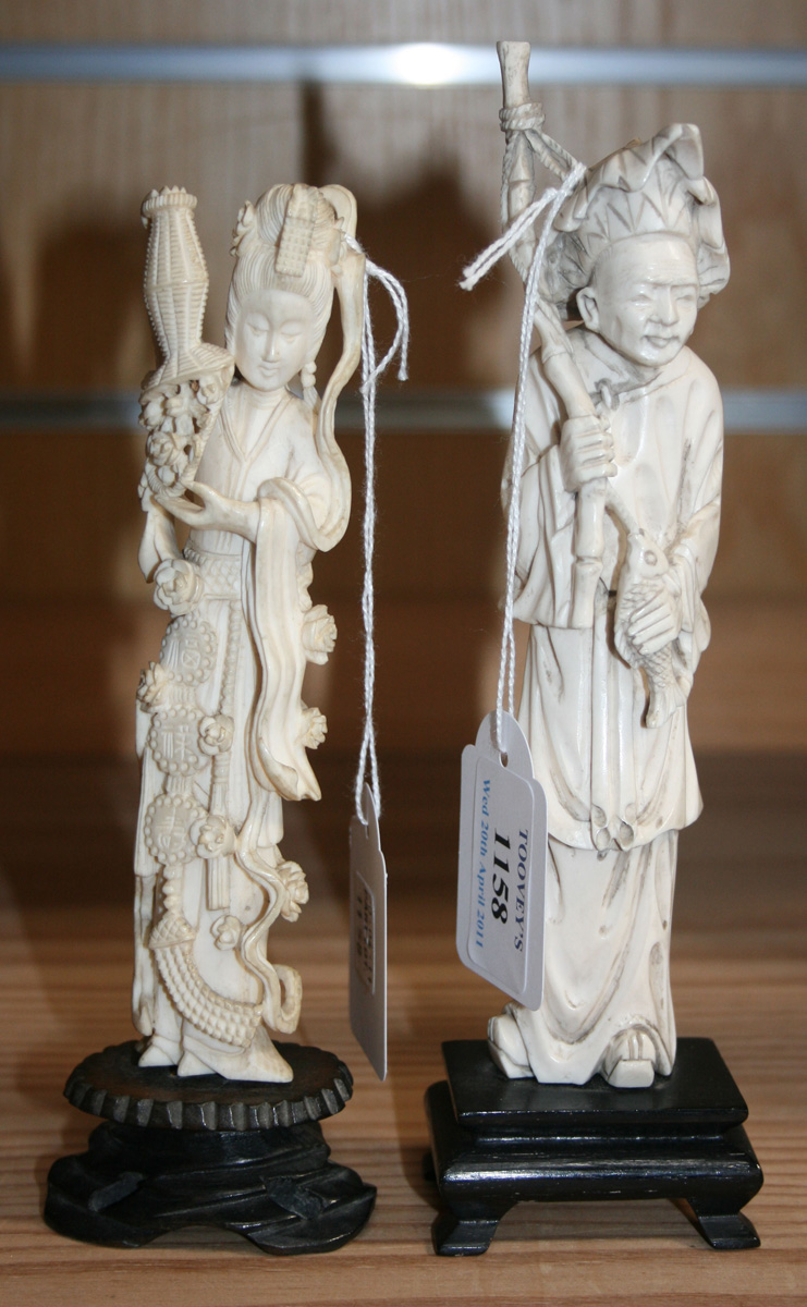 A Chinese Carved Ivory Figure Of A Fisherman 20th Century On An