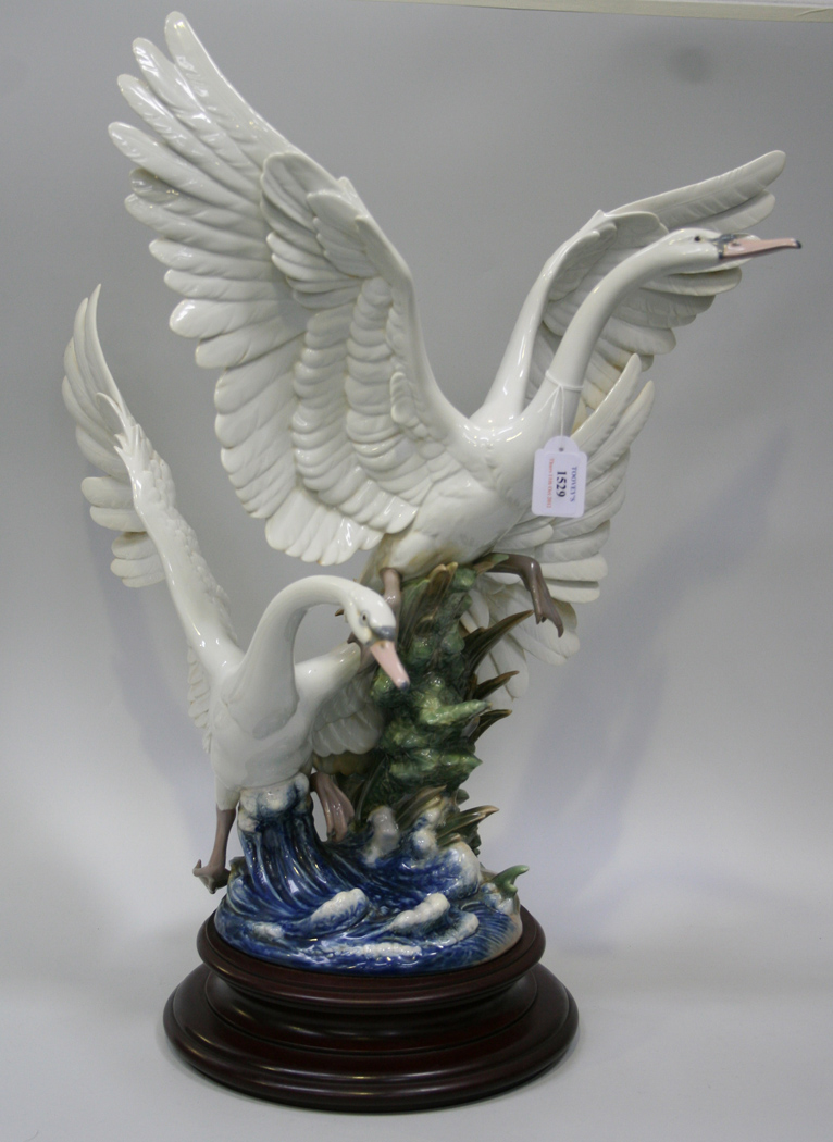 Swans Take Flight Porcelain Sculpture
