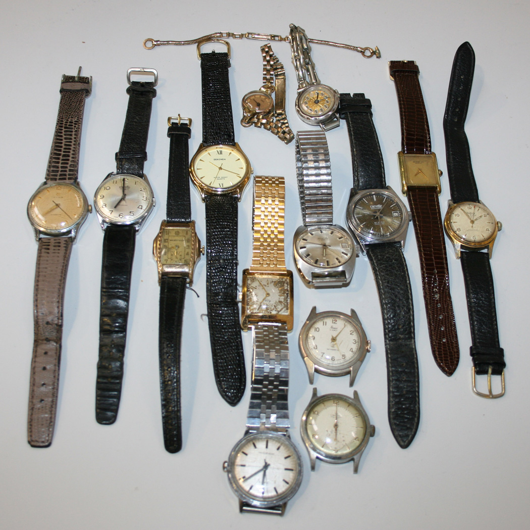 A Timex steel backed gentleman's wristwatch, on a metal bracelet, an ...