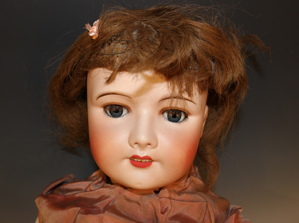An Unis France bisque head doll, impressed '71 301 140 301 14