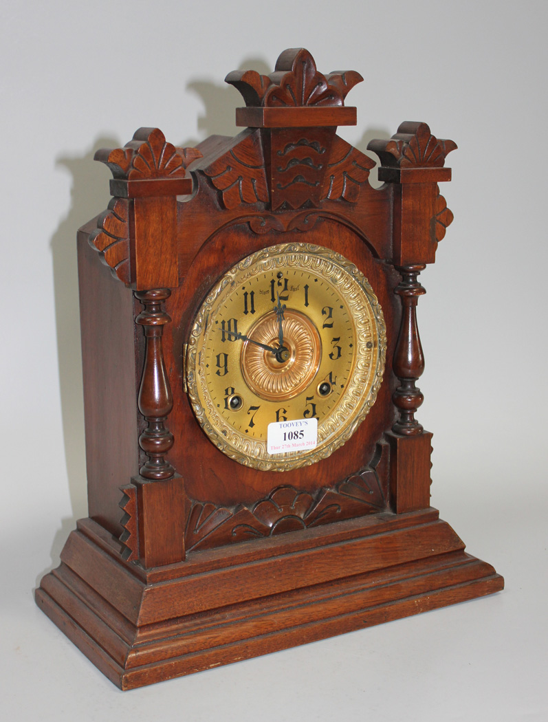 A Late 19th Century American Walnut Mantel Clock With Eight Day