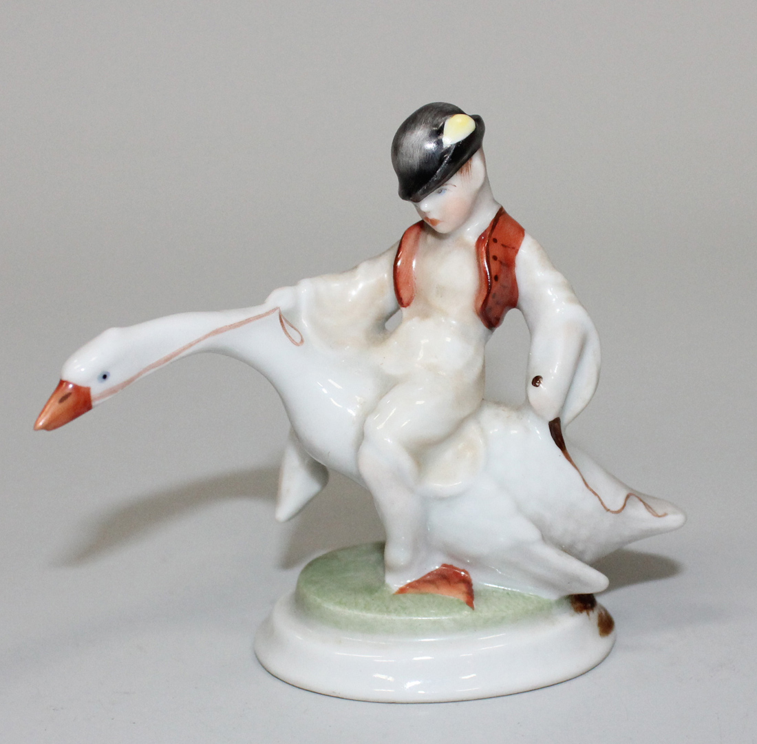 A Herend porcelain figure group of a boy riding a goose, 20th Century ...