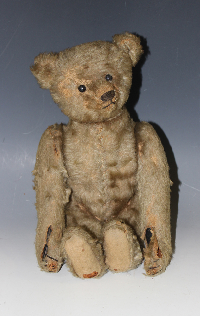 An early Steiff mohair clockwork teddy bear with button in