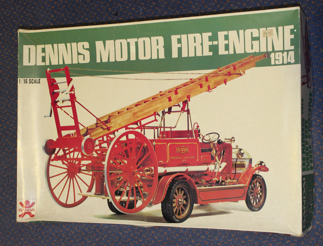A collection of ten plastic model kits, including Bandai Dennis