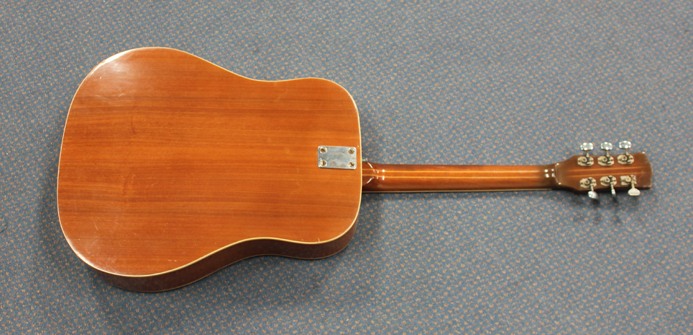 An Eros Model 606 Dakota acoustic six string guitar bearing