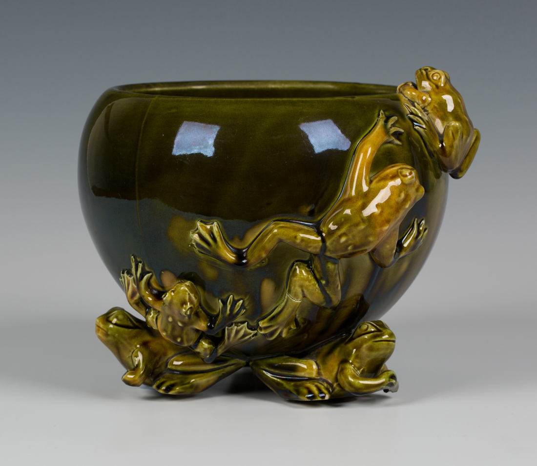 A Green Glazed Pottery Jardiniere Designed By Christopher Dresser