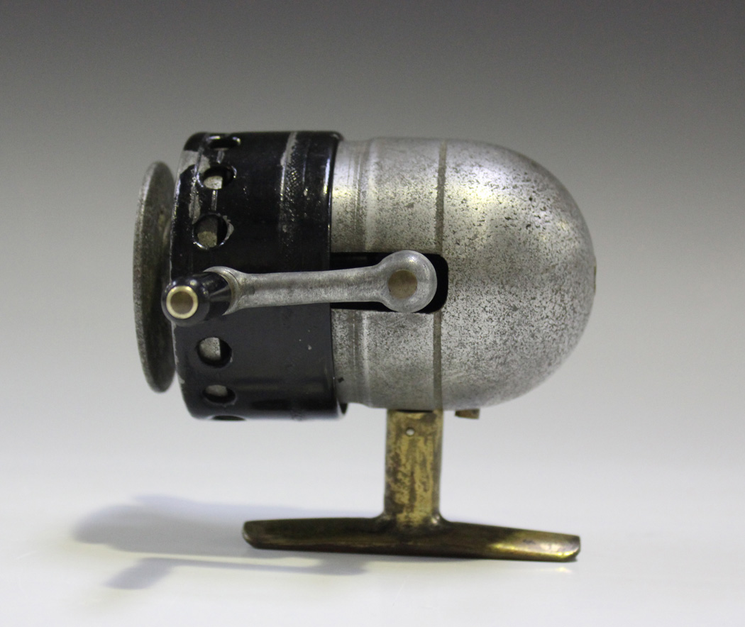A rare Milward-Bartleet 'Torpedo' light casting fishing reel, within a  mahogany box.