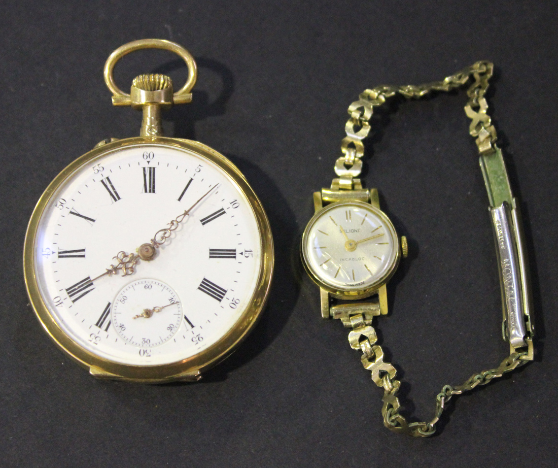 A gold cased keyless wind open-faced fob watch with an unsigned gilt ...