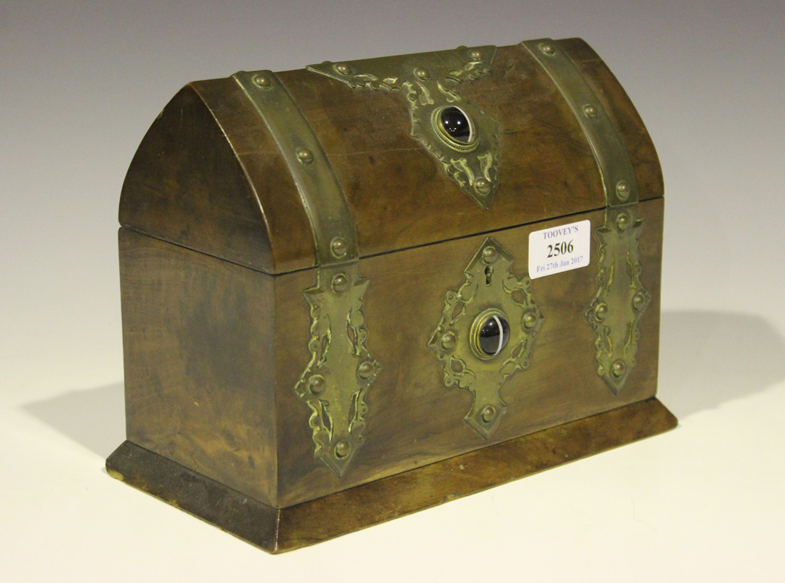 A late 19th century Gothic Revival walnut dome topped box, the hinged